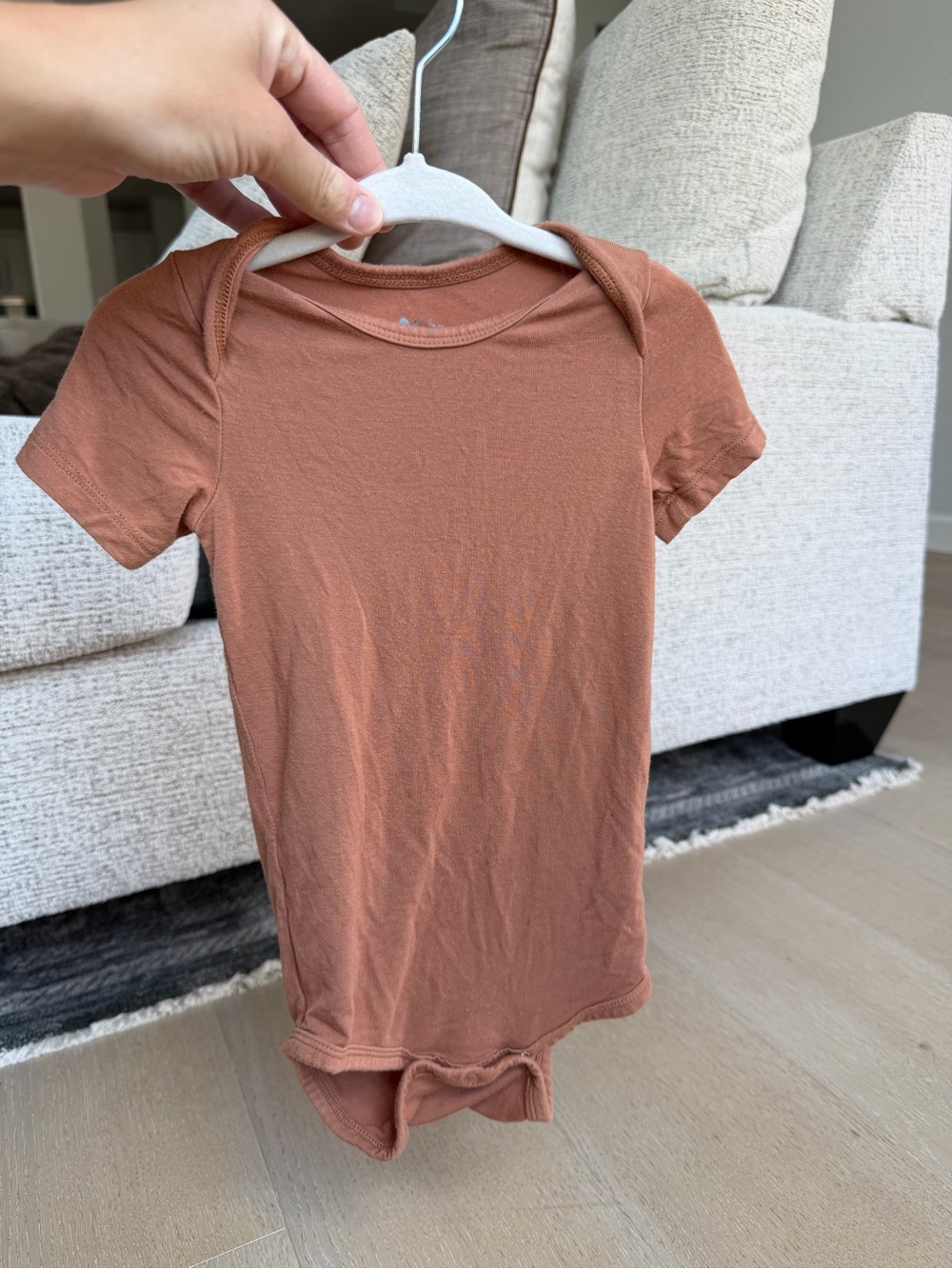 Kyte BABY Short Sleeve One-Piece Bodysuit in Rust